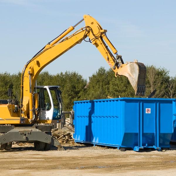 truck delivering a residential dumpster rental